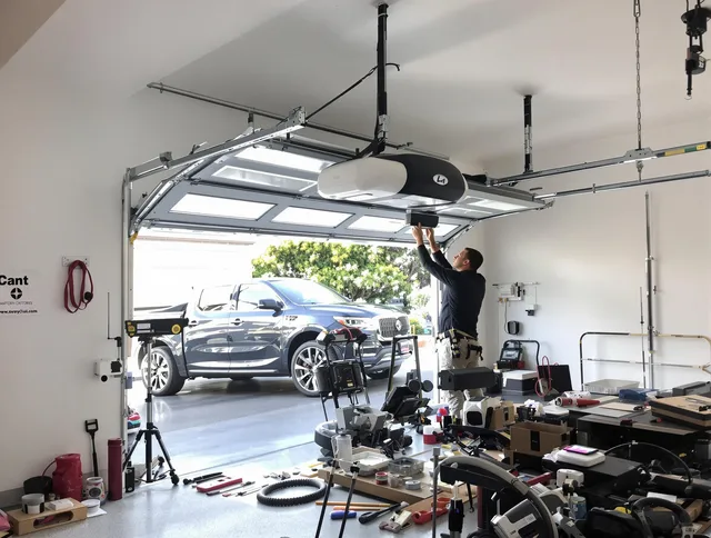 Killingly Garage Door Repair specialist installing smart garage door opener system in Killingly home