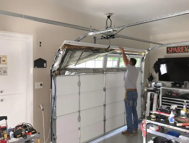 Garage door section replacement by Killingly Garage Door Repair in Killingly