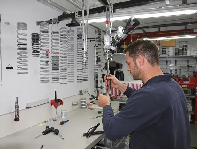 Killingly Garage Door Repair safety certified technician performing precision spring replacement in Killingly